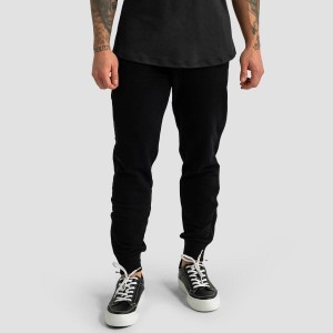 Joggery męskie fitness slim z kieszeniami Limitless