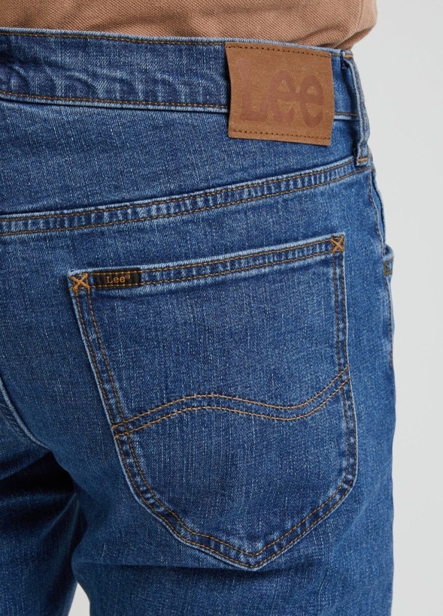 LEE DAREN ZIP FLY MĘSKIE SPODNIE JEANSOWE STONEAGE MID L707KND14 112338472