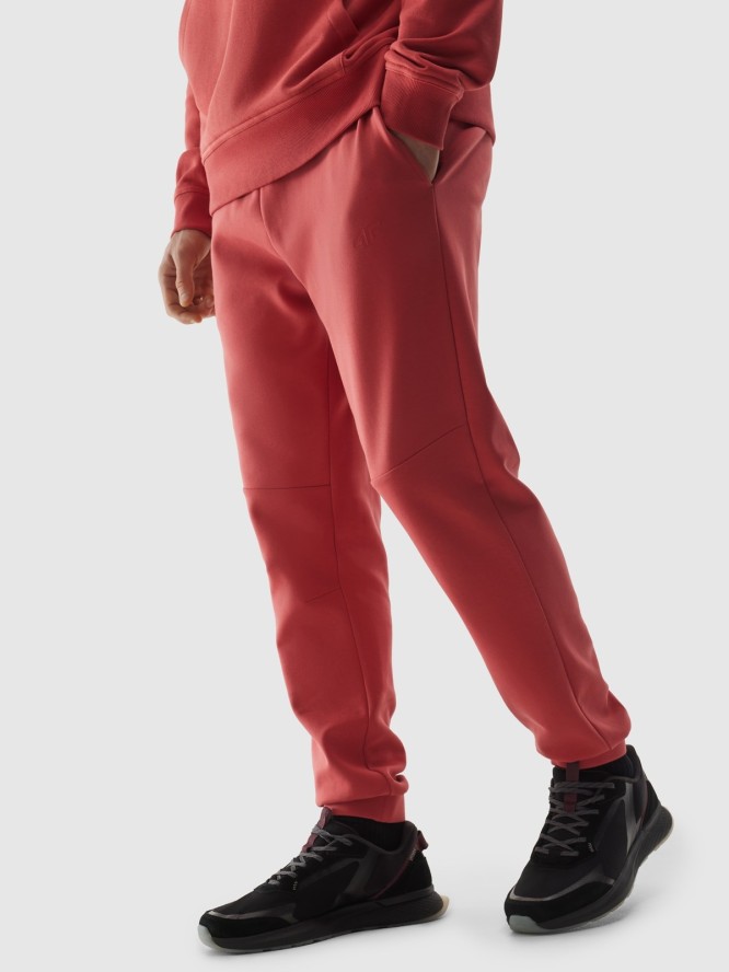 4F Spodnie dresowe joggery męskie - różowe XL