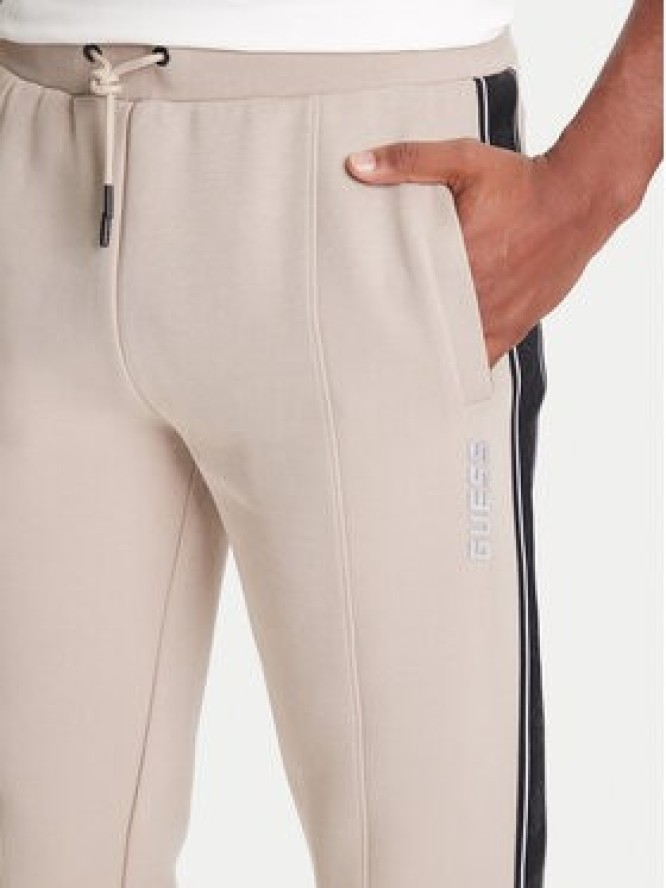 Guess Spodnie dresowe Z2YB09 KB3P2 Beżowy Regular Fit