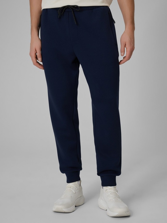 4F Spodnie dresowe joggery męskie - granatowe S