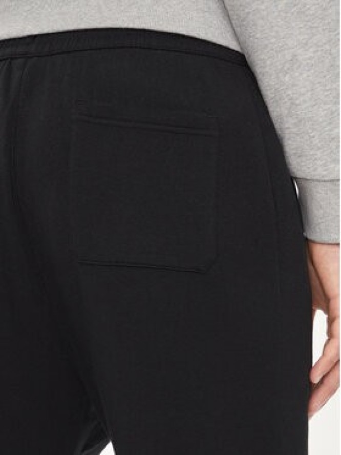 Reebok Spodnie dresowe Actic Coll Dreamblend 100075686 Czarny Regular Fit