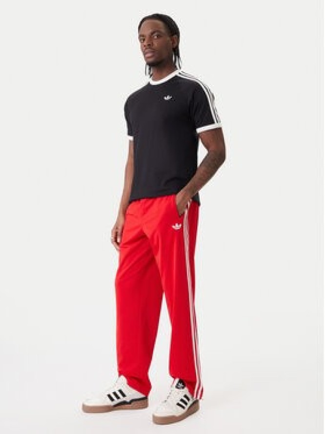 adidas Spodnie dresowe Firebird KD8319 Czerwony Loose Fit