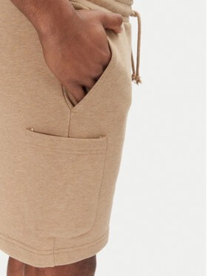 Tommy Jeans Szorty sportowe Badge DM0DM18479 Beżowy Regular Fit