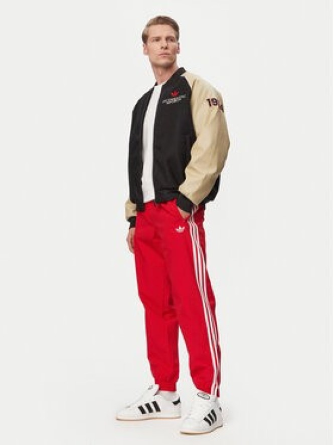 adidas Spodnie dresowe Firebird Woven KE1369 Czerwony Regular Fit