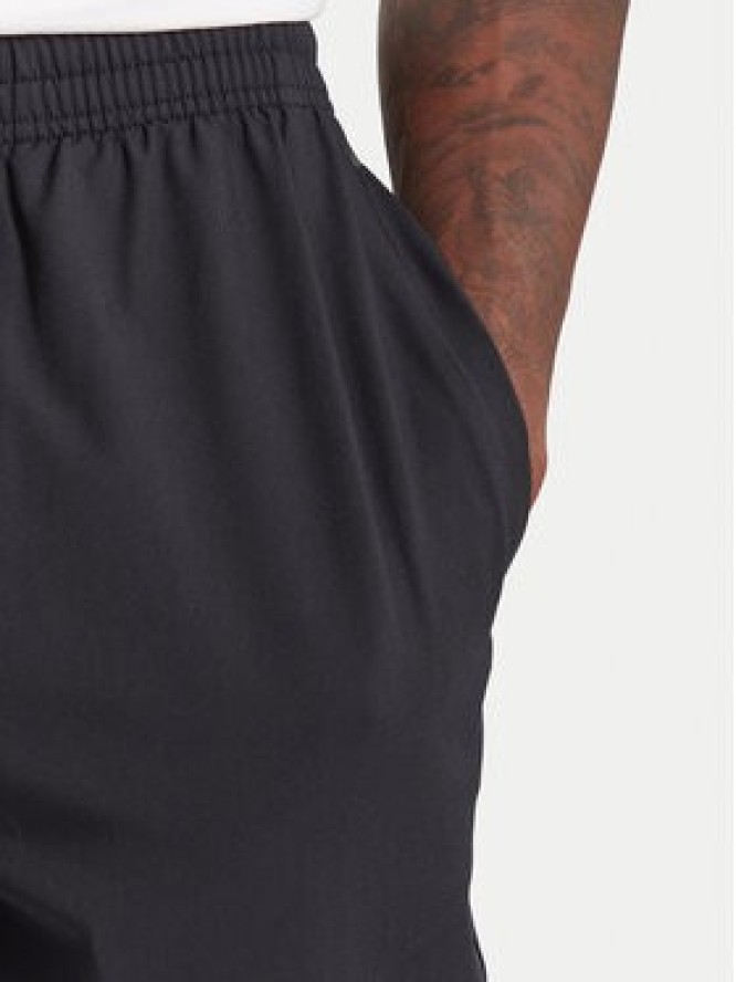 Under Armour Spodnie dresowe Unstoppable 6003861 Czarny Loose Fit