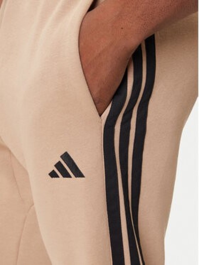 adidas Spodnie dresowe Essentials 3-Stripes JX0712 Beżowy Regular Fit