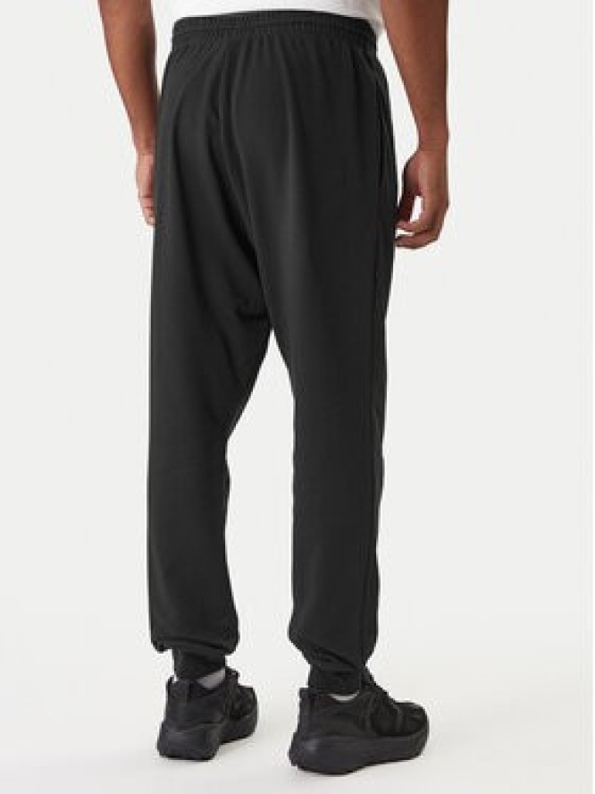 adidas Spodnie dresowe Essentials Feel Cozy JE3854 Czarny Regular Fit