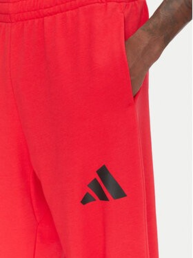 adidas Spodnie dresowe Essentials JF3601 Czerwony Loose Fit