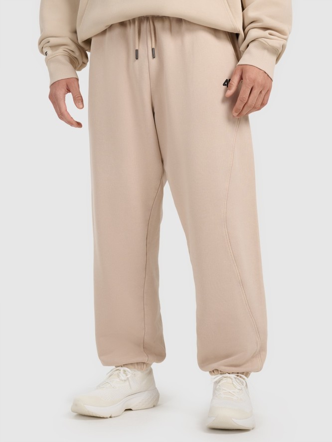 4F Spodnie dresowe joggery męskie 4F x Tomasz Fornal - beżowe M