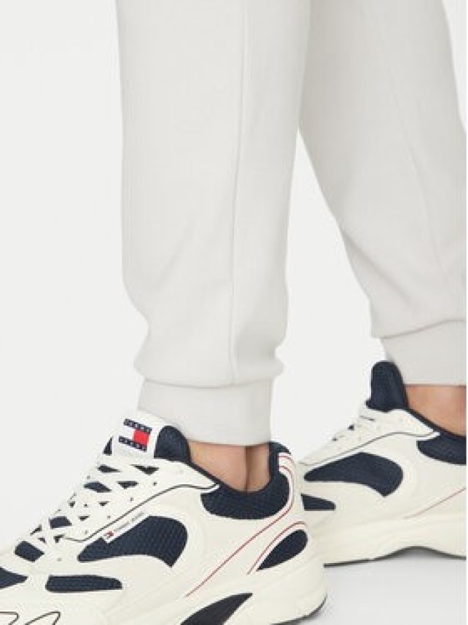 Tommy Hilfiger Spodnie dresowe UM0UM03348 Beżowy Regular Fit