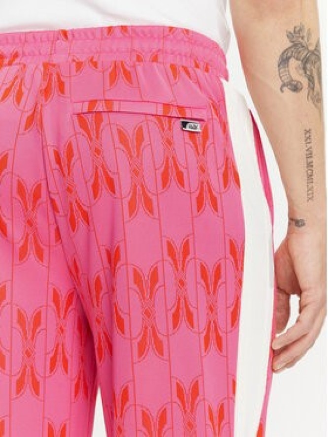 Puma Spodnie dresowe The NeverWorn V T7 631492 Różowy Regular Fit