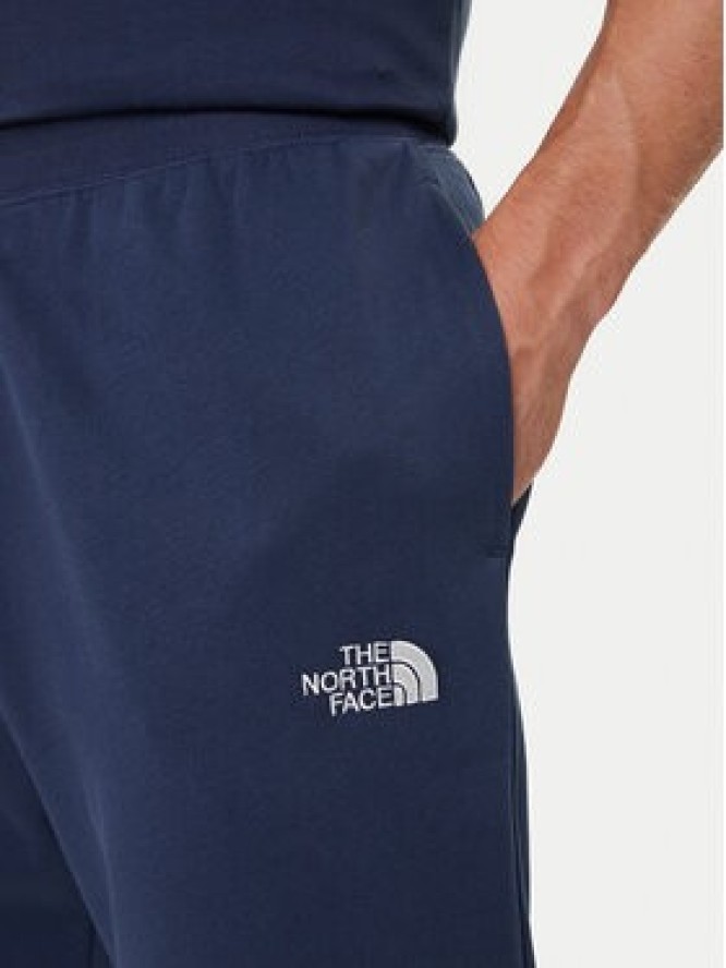 The North Face Spodnie dresowe Essential NF0A8C1F Granatowy Relaxed Fit