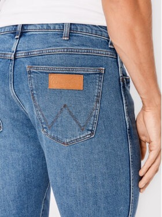 Wrangler Jeansy Larston W18SJX21Y 112322663 Niebieski Slim Tapered Fit