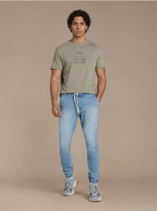 Jeansy jogger z efektem sprania - niebieski