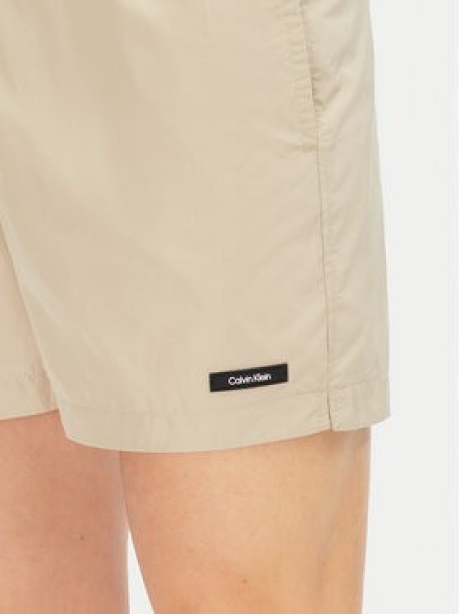 Calvin Klein Swimwear Szorty kąpielowe KM0KM01111 Beżowy Regular Fit
