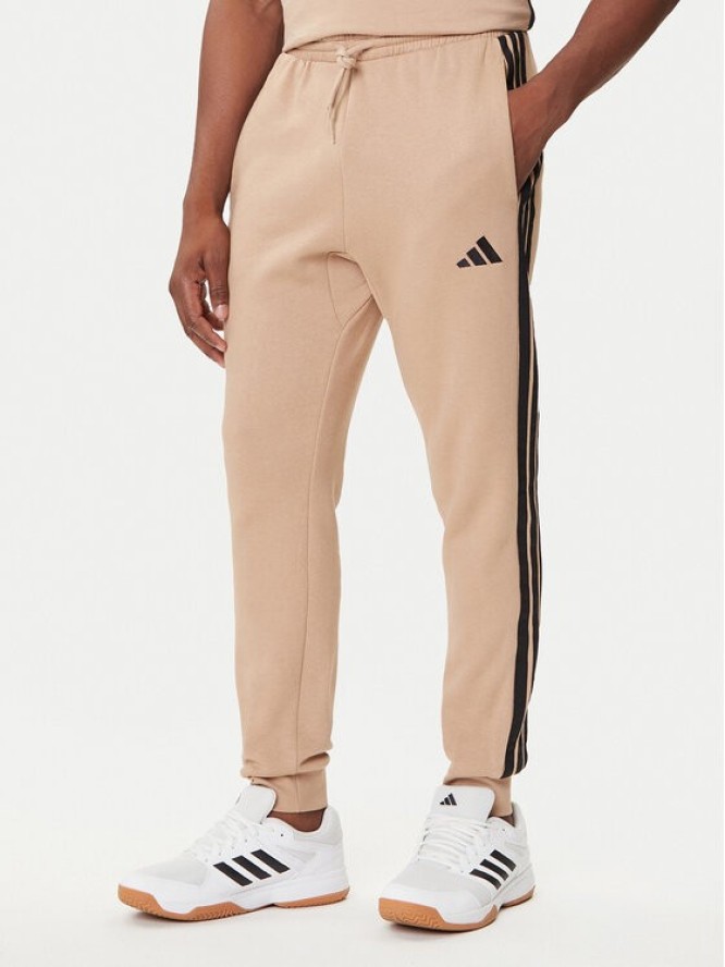 adidas Spodnie dresowe Essentials 3-Stripes JX0712 Beżowy Regular Fit