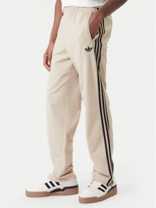 adidas Spodnie dresowe Firebird KE6679 Beżowy Loose Fit