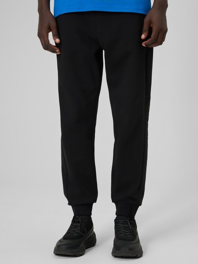 4F Spodnie dresowe joggery męskie - czarne M