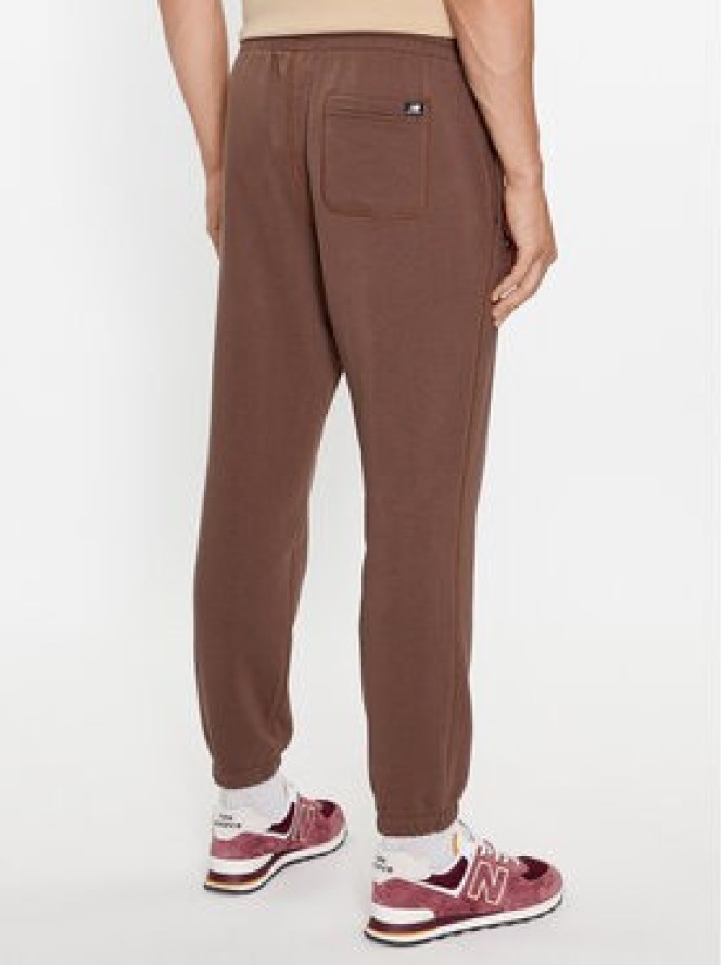 New Balance Spodnie dresowe NB Essentials Sweatpant MP33509 Brązowy Regular Fit
