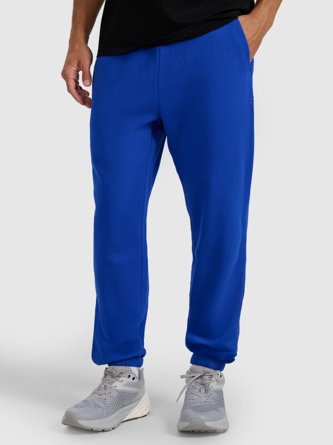 4F Spodnie dresowe joggery męskie - niebieskie L