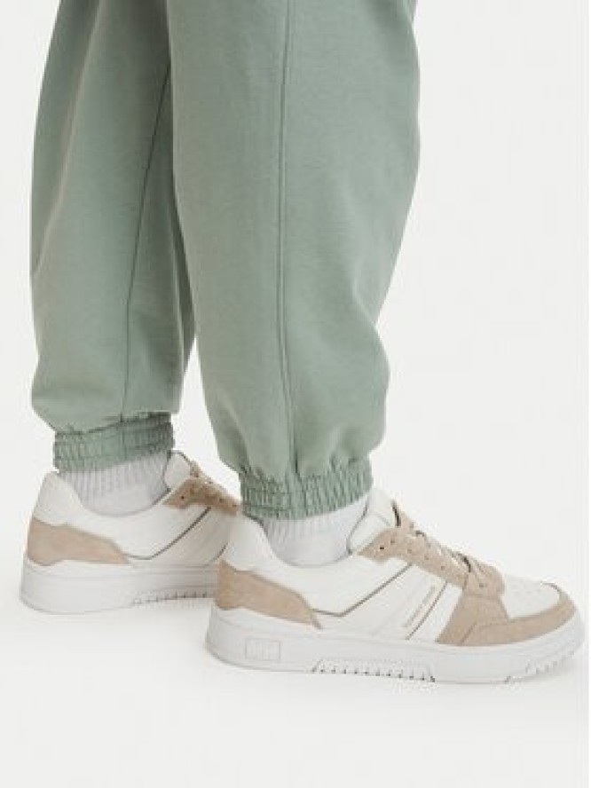 Tommy Hilfiger Spodnie dresowe Essential UM0UM03911 Zielony jasny Relaxed Fit