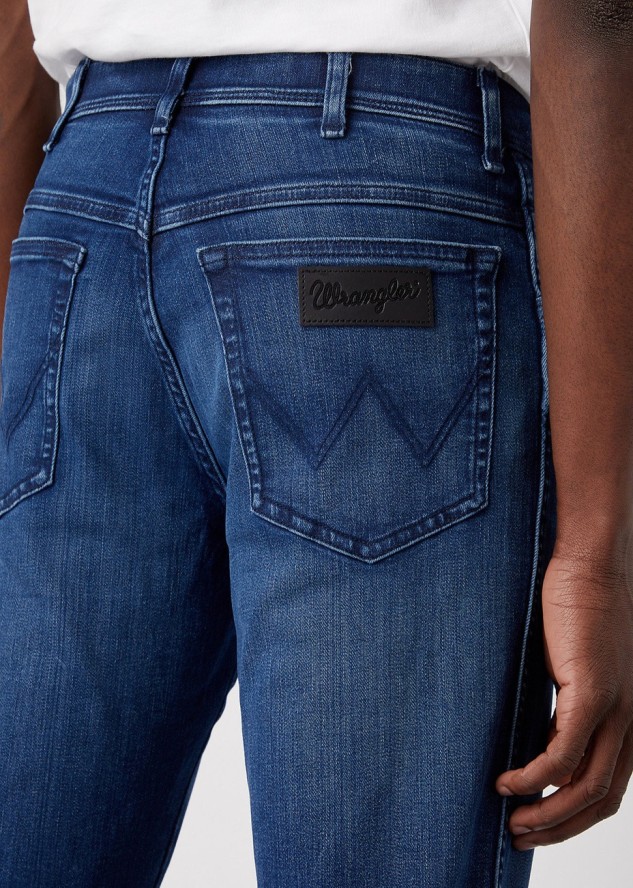 WRANGLER TEXAS SLIM MĘSKIE SPODNIE JEANSOWE APOLLO W12SMN396