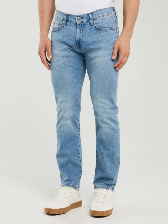 Jeansy męskie dopasowane z przetarciami jasnoniebieskie Tobias 295