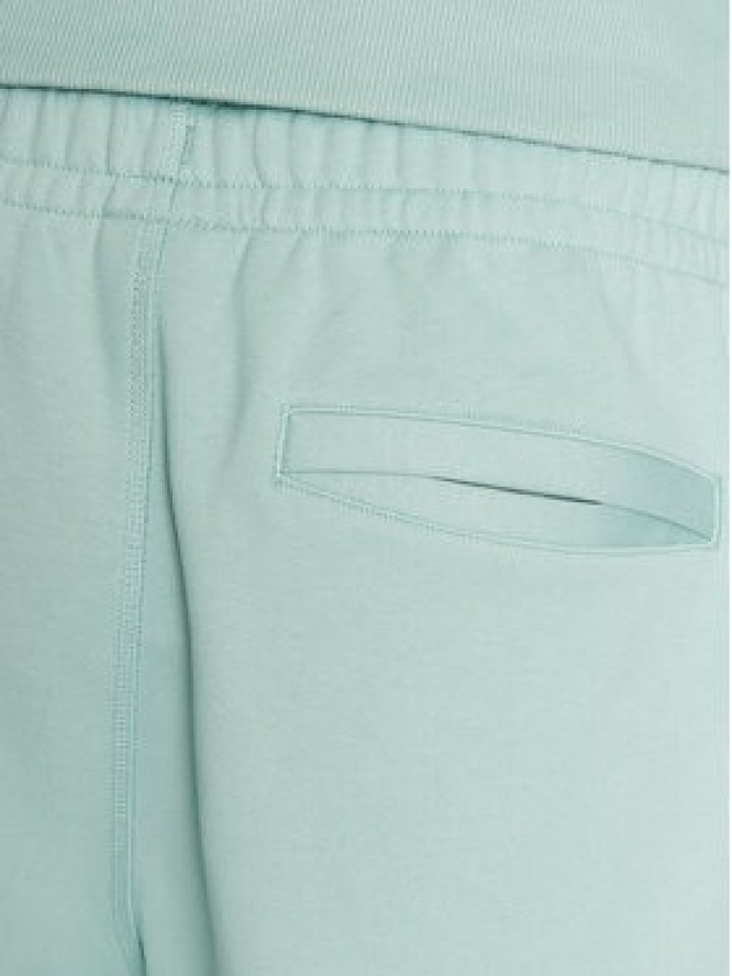 New Balance Spodnie dresowe MP23551 Zielony Relaxed Fit