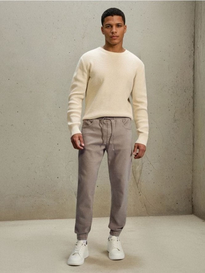 Jeansy jogger - kremowy