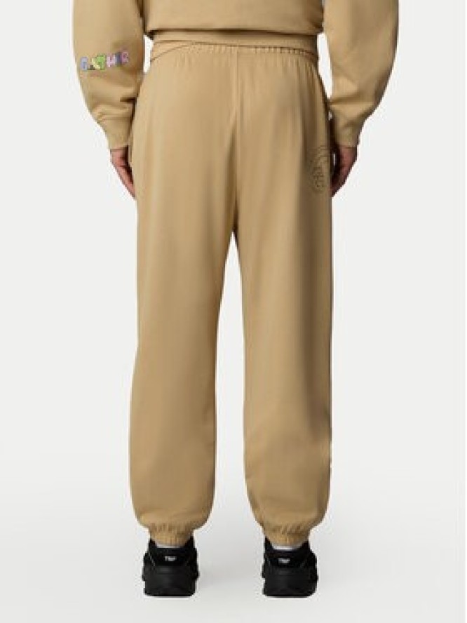 The North Face Spodnie dresowe Unisex Mountain Cleanup NF0A8C2W Beżowy Relaxed Fit