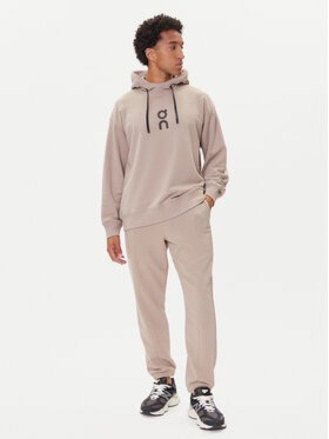 On Spodnie dresowe Club Pants 1ME1004 Beżowy Relaxed Fit