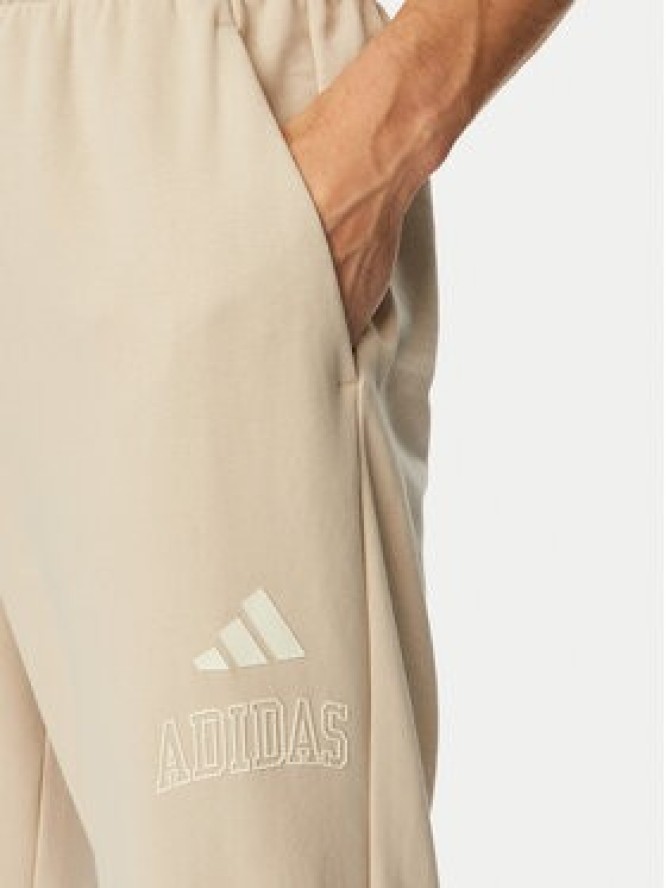 adidas Spodnie dresowe Seasonal Essentials Collegiate French Terry Cuffed KF4265 Beżowy Regular Fit