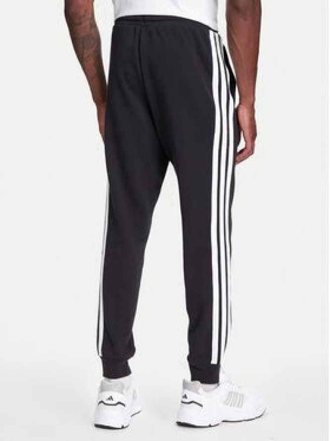 adidas Spodnie dresowe Essential 3-Stripes JD1881 Czarny Regular Fit