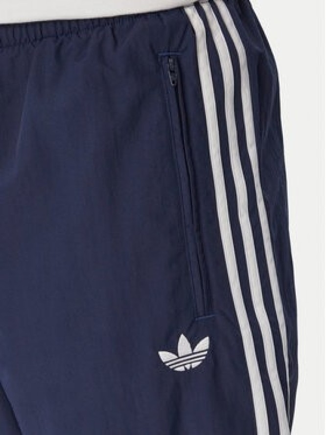 adidas Spodnie dresowe Firebird Woven KE1370 Granatowy Regular Fit