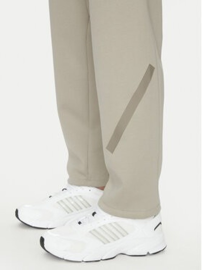 adidas Spodnie dresowe Z.N.E. Open-Hem JC6716 Beżowy Loose Fit