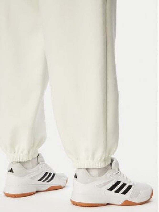 adidas Spodnie dresowe Soft Lux KF8574 Kremowy Regular Fit