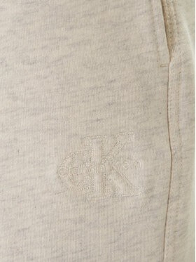 Calvin Klein Jeans Spodnie dresowe Embossed Monologo LV047F206G Beżowy Wide Leg