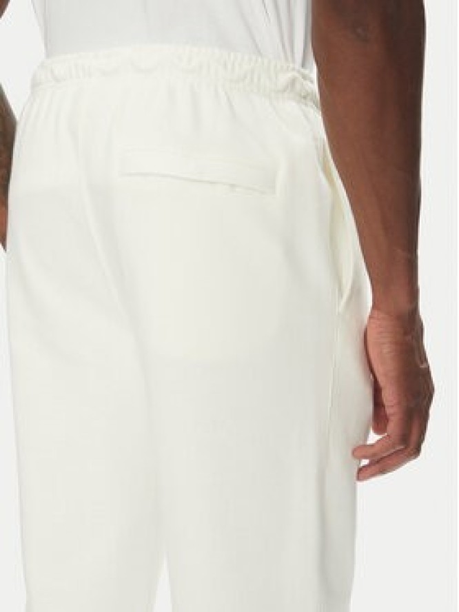 Nike Spodnie dresowe FN3801 Écru Regular Fit