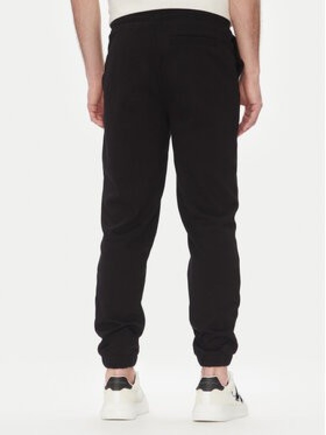 Calvin Klein Jeans Spodnie dresowe Painted J30J327535 Czarny Regular Fit
