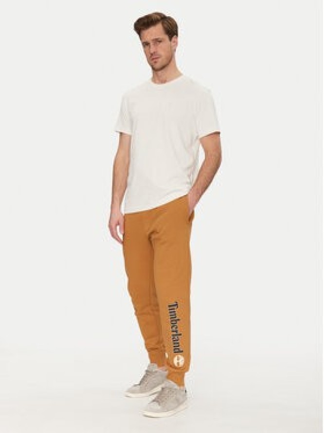 Timberland Spodnie dresowe TB0A5YFB Beżowy Regular Fit