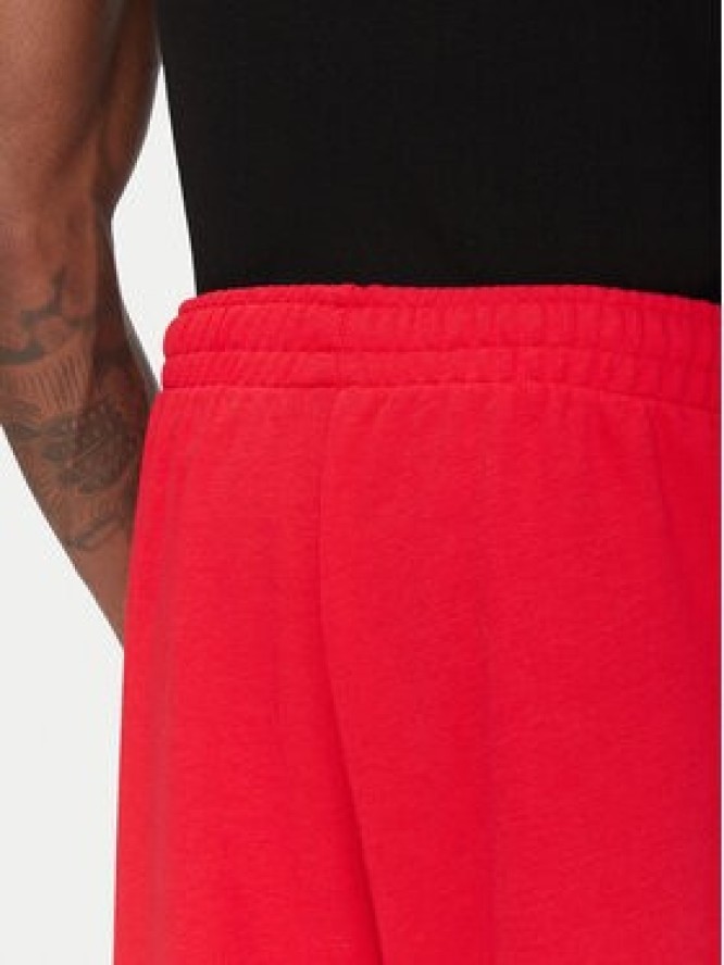adidas Spodnie dresowe Essentials JF3601 Czerwony Loose Fit
