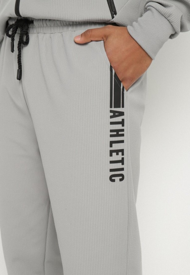Szare Spodnie Dresowe Typu Jogger z Kieszeniami Zdobione Nadrukami Mepessa