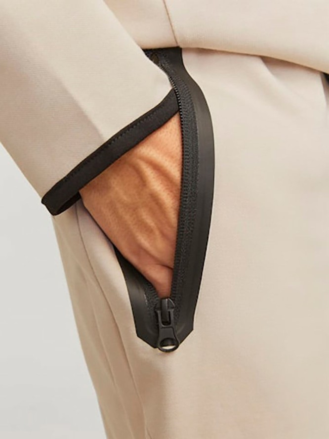 Jack & Jones Spodnie dresowe w kolorze kremowym rozmiar: M