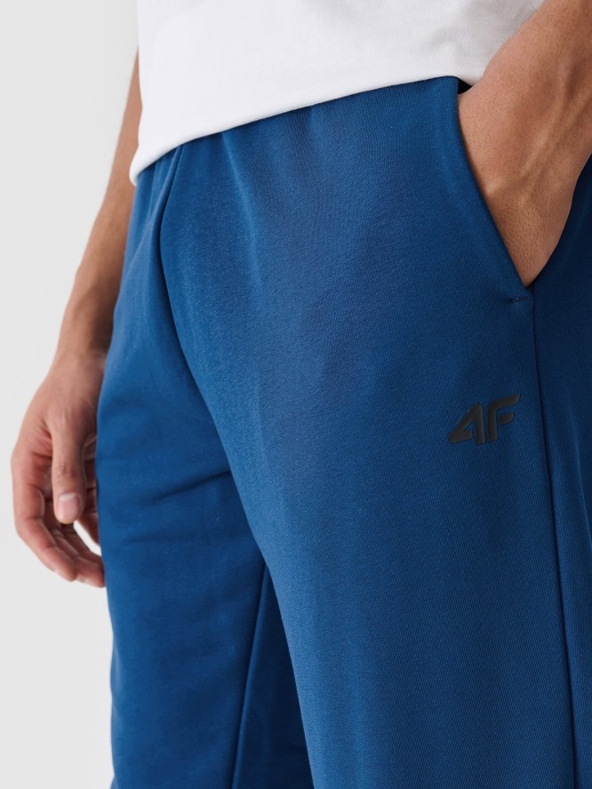 4F Spodnie dresowe joggery męskie - turkusowe XL