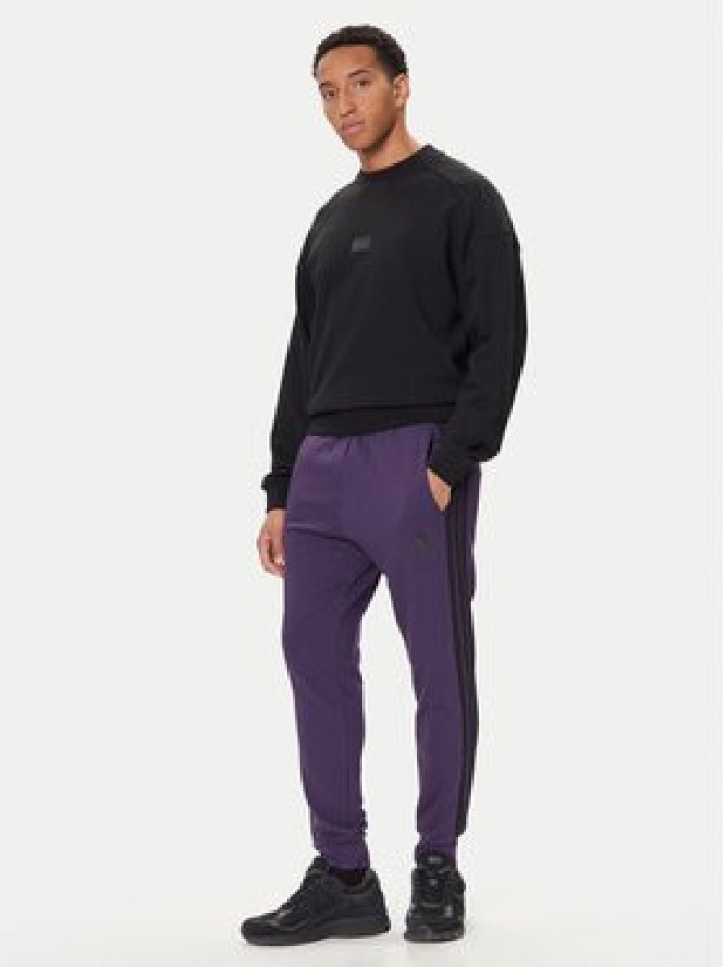 adidas Spodnie dresowe Essentials 3-Stripes JX0750 Fioletowy Regular Fit