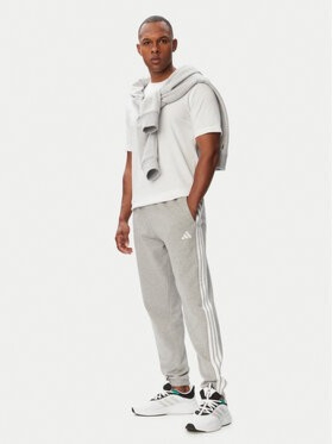adidas Spodnie dresowe Essentials 3-Stripes KY4195 Szary jasny Regular Fit