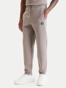 HUGO Spodnie dresowe Dimacs 50533695 Beżowy Relaxed Fit