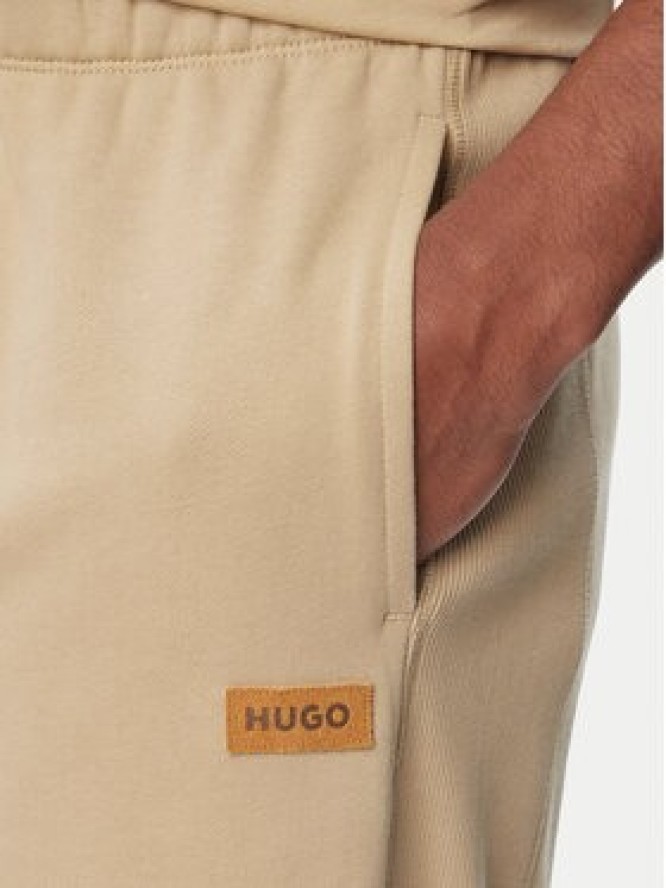 HUGO Spodnie dresowe Nevatro 50564047 Beżowy Regular Fit