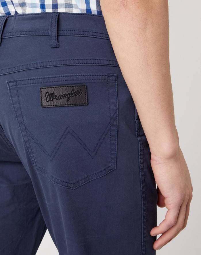 WRANGLER TEXAS SLIM MĘSKIE SPODNIE MATERIAŁOWE NAVY W12SWA114 112126532